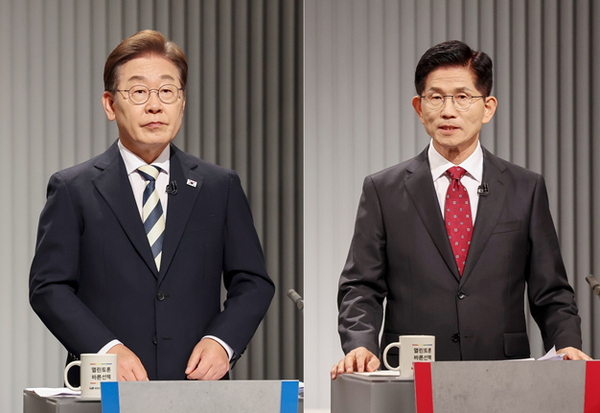이재명 더불어민주당(왼쪽), 김문수 국민의힘 대선후보가 23일 서울 여의도 KBS 스튜디오에서 열린 제21대 대선 2차 후보자 토론회를 준비하고 있다. 사진=연합뉴스
